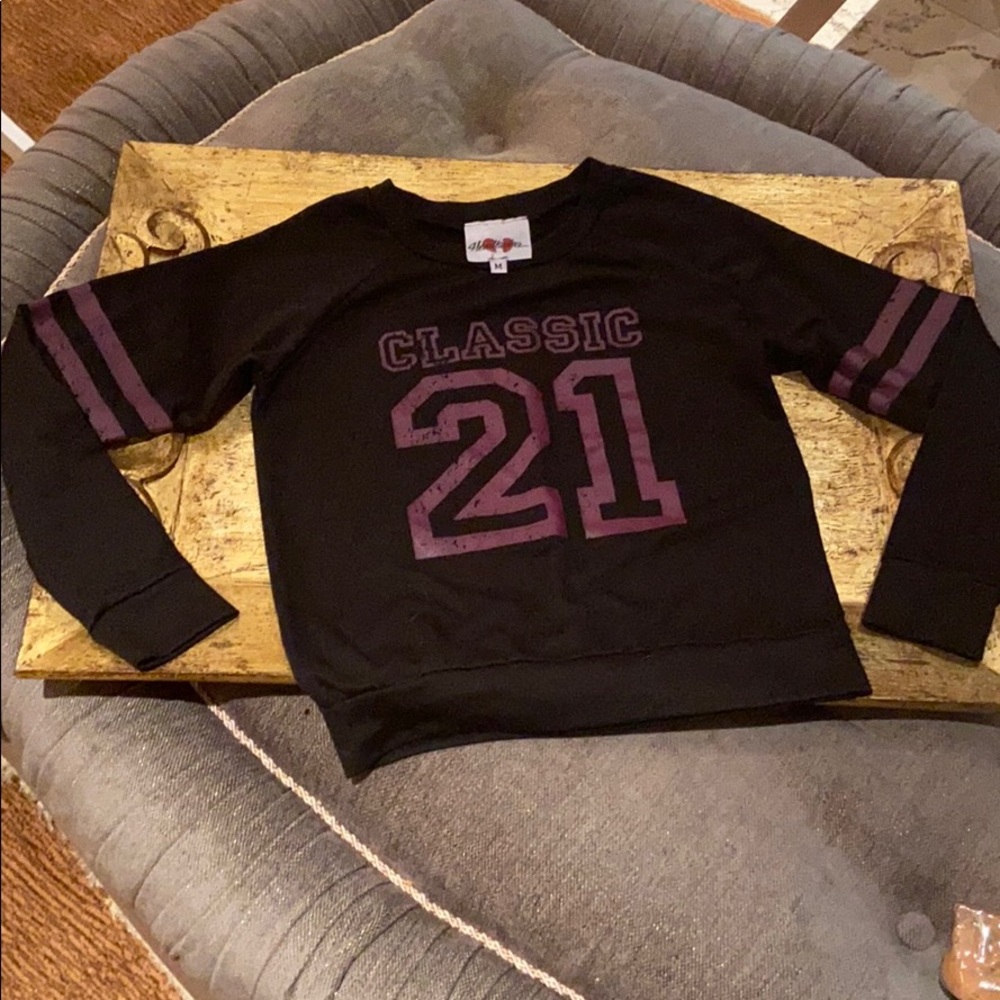Heartbreaker girls Sz M long sleeve top.